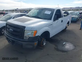 2014 Ford F-150 XL with VIN 1FTMF1CM3EKG36797, listed as a IAAI auction lot 40892574 with 136,417 mi miles. Bid and sale history available at carsss.com. Image 16.