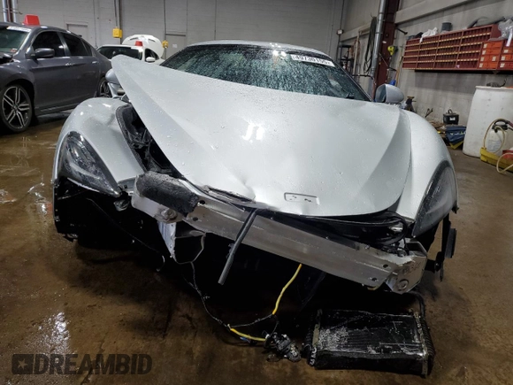 2018 McLaren 570S z VIN SBM13FAA2JW004594, wystawiony jako Copart lot #49730155 z przebiegiem Nie podano mil oraz Szkody całkowita. Historia ofert i sprzedaży dostępna na DreamBid. Obrazek 5.