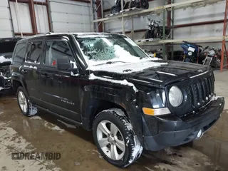 2014 Jeep Patriot Limited with VIN 1C4NJRCB8ED910340, listed as a IAAI auction lot 41396065 with 241,669 mi miles. Bid and sale history available at carsss.com. Image 1.