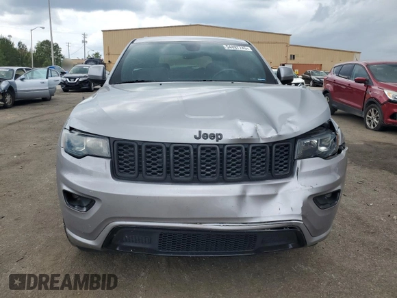 2018 Jeep Grand Cherokee Altitude with VIN 1C4RJEAG9JC246753, listed as a Copart auction lot 54497745 with 121,665 mi miles and Salvage title. Bid and sale history available at DreamBid. Image 5.