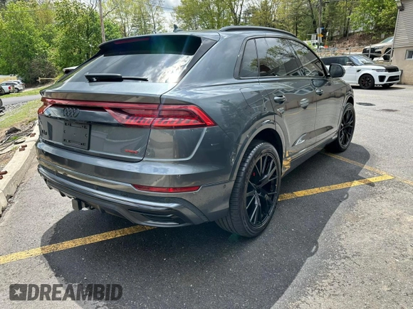2021 Audi Q8 Premium Plus z VIN WA1EVAF17MD034670, wystawiony jako Copart lot #56331855 z przebiegiem 79 150 mil mil oraz Tytuł czysty. Historia ofert i sprzedaży dostępna na DreamBid. Obrazek 3.