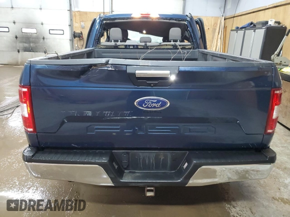 2018 Ford F-150 XL with VIN 1FTFX1E57JFE75983, listed as a Copart auction lot 52619685 with 184,124 mi miles and Clean title. Bid and sale history available at DreamBid. Image 6.