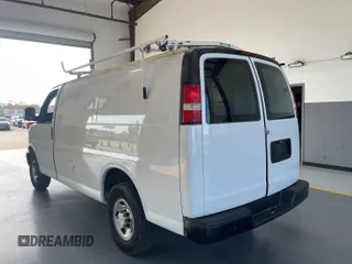 2015 Chevrolet Express Cargo with VIN 1GCWGFCF5F1172987, listed as a IAAI auction lot 42775101 with 159,466 mi miles and . Bid and sale history available at DreamBid. Image 4.
