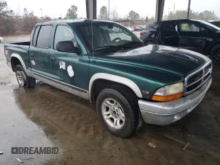 2003 Dodge Dakota SLT with VIN 1D7HL48X03S261436, listed as a Copart auction lot 42317965 with 136,380 mi miles and Salvage Title. Bid and sale history available at carsss.com. Image 4.