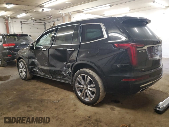 2023 Cadillac XT6 AWD Premium Luxury z VIN 1GYKPDRS0PZ209335, wystawiony jako Copart lot #48555685 z przebiegiem 30 375 mil mil oraz Szkoda całkowita • Salvage title. Historia ofert i sprzedaży dostępna na DreamBid. Obrazek 2.