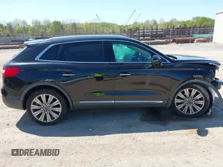 2016 Lincoln MKX Black Label with VIN 2LMPJ9JP1GBL55716, listed as a IAAI auction lot 42002075 with 85,200 mi miles. Bid and sale history available at carsss.com. Image 12.