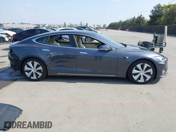 2020 Tesla Model S Long Range with VIN 5YJSA1E24LF415849, listed as a IAAI auction lot 42571945 with 34,398 mi miles and . Bid and sale history available at DreamBid. Image 14.