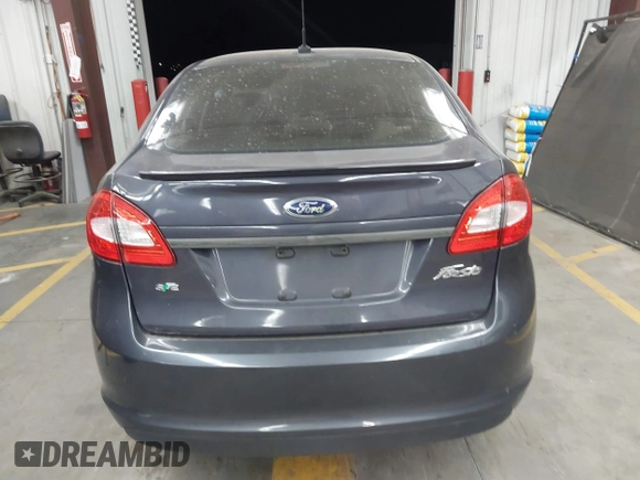 2013 Ford Fiesta SE z VIN 3FADP4BJ1DM186232, wystawiony jako IAAI lot #42304613 z przebiegiem 105 919 mil mil oraz . Historia ofert i sprzedaży dostępna na DreamBid. Obrazek 16.