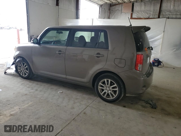 2012 Scion xB z VIN JTLZE4FE6C1145727, wystawiony jako Copart lot #54135915 z przebiegiem 111 652 mil mil oraz Szkody całkowita. Historia ofert i sprzedaży dostępna na DreamBid. Obrazek 2.