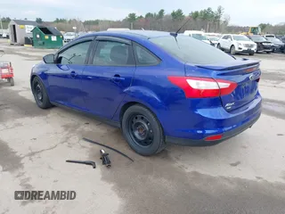 2014 Ford Focus SE with VIN 1FADP3F21EL314534, listed as a IAAI auction lot 42130032 with 103,866 mi miles. Bid and sale history available at carsss.com. Image 3.