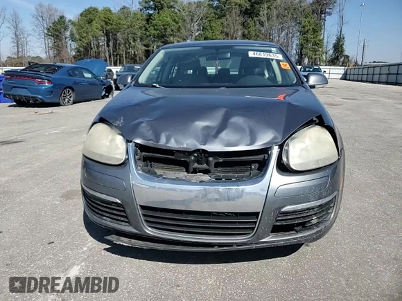 2007 Volkswagen Jetta 2.5 z VIN 3VWSF71K77M092907, wystawiony jako Copart lot #46819635 z przebiegiem 234 826 mil mil oraz Nie do naprawy • Non repairable. Historia ofert i sprzedaży dostępna na DreamBid. Obrazek 10.