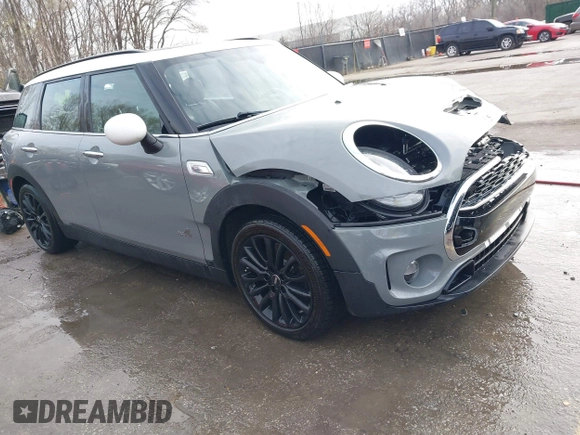 2017 MINI Clubman Cooper S with VIN WMWLU5C59H2E83705, listed as a IAAI auction lot 41853702 with 135,905 mi miles. Bid and sale history available at carsss.com. Image 1.