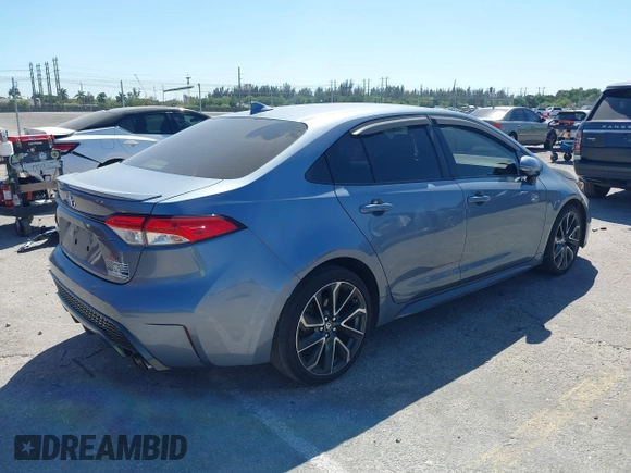 2021 Toyota Corolla SE with VIN JTDS4MCE1MJ063524, listed as a IAAI auction lot 41822622 with 50,882 mi miles. Bid and sale history available at carsss.com. Image 4.