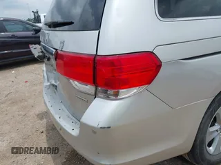 2009 Honda Odyssey Touring z VIN 5FNRL38979B052923, wystawiony jako IAAI lot #42427207 z przebiegiem 201 483 mil mil oraz . Historia ofert i sprzedaży dostępna na DreamBid. Obrazek 20.