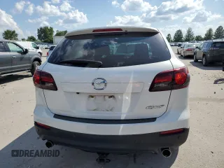 2015 Mazda CX-9 Touring z VIN JM3TB2CA6F0456866, wystawiony jako Copart lot #61475635 z przebiegiem 180 916 mil mil oraz Czysty tytuł • Clean title. Historia ofert i sprzedaży dostępna na DreamBid. Obrazek 6.