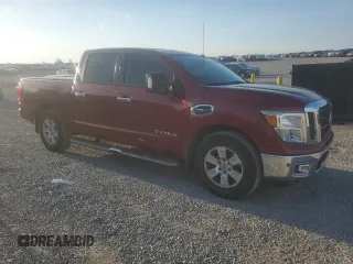 2017 Nissan Titan SV with VIN 1N6AA1E67HN557309, listed as a Copart auction lot 53748735 with 112,197 mi miles and Salvage title. Bid and sale history available at DreamBid. Image 4.