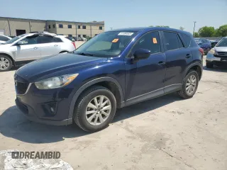 2014 Mazda CX-5 Touring z VIN JM3KE2CYXE0327950, wystawiony jako Copart lot #51390585 z przebiegiem 129 523 mil mil oraz Czysty tytuł • Clean title. Historia ofert i sprzedaży dostępna na DreamBid. Obrazek 1.