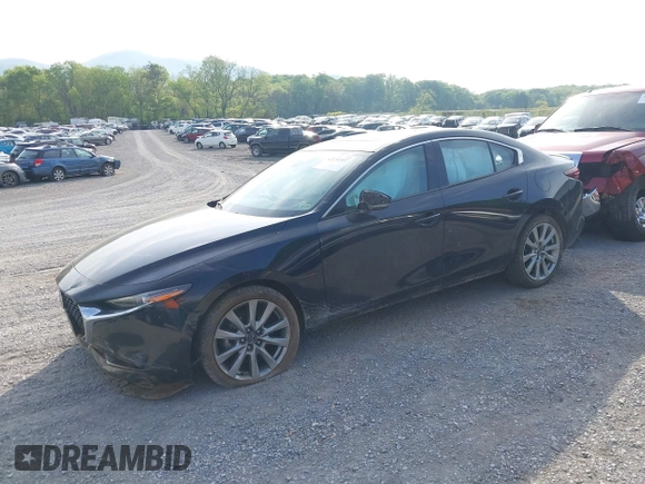 2021 Mazda 3 Premium z VIN 3MZBPADL2MM254467, wystawiony jako IAAI lot #42151557 z przebiegiem 63 282 mil mil oraz . Historia ofert i sprzedaży dostępna na DreamBid. Obrazek 18.