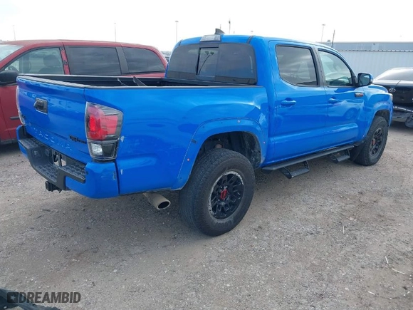 2019 Toyota Tacoma 4WD SR with VIN 5TFCZ5AN0KX199524, listed as a IAAI auction lot 41230720 with 91,183 mi miles. Bid and sale history available at carsss.com. Image 4.