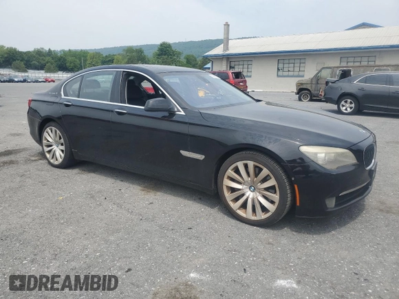 2012 BMW 7 Series with VIN WBAKX6C52CC197154, listed as a Copart auction lot 59897855 with 114,279 mi miles and Clean title. Bid and sale history available at DreamBid. Image 4.