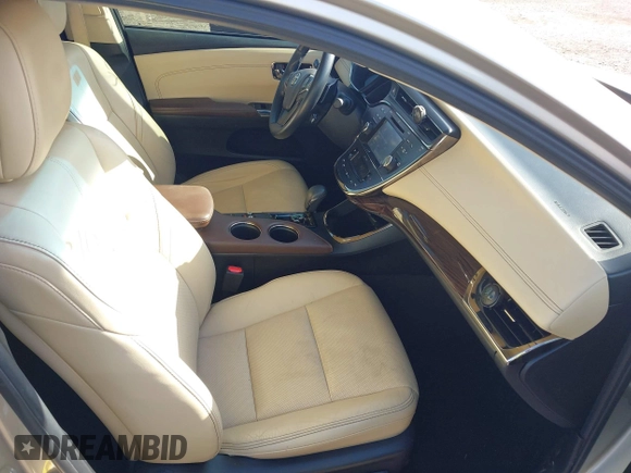 2015 Toyota Avalon Limited with VIN 4T1BK1EB2FU167671, listed as a IAAI auction lot 41710375 with 77,126 mi miles and . Bid and sale history available at DreamBid. Image 5.