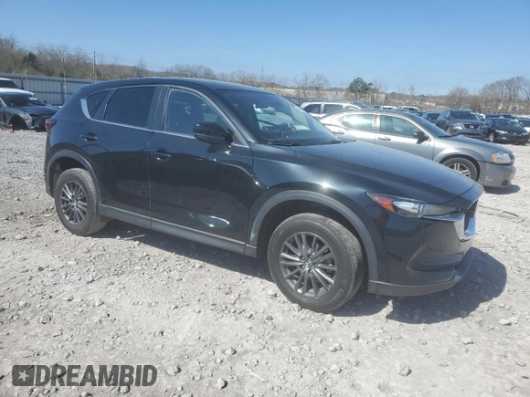 2020 Mazda CX-5 Touring with VIN JM3KFACM9L0733719, listed as a Copart auction lot 48695555 with 93,092 mi miles and Salvage Title. Bid and sale history available at carsss.com. Image 4.