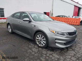 2018 Kia Optima LX with VIN 5XXGT4L3XJG253653, listed as a IAAI auction lot 41316235 with 84,261 mi miles. Bid and sale history available at carsss.com. Image 1.