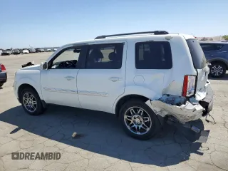 2013 Honda Pilot Touring with VIN 5FNYF4H95DB016049, listed as a Copart auction lot 61012725 with 104,252 mi miles and Salvage title. Bid and sale history available at DreamBid. Image 2.