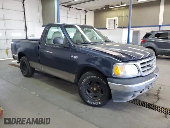 2003 Ford F-150 XL with VIN 1FTRF17293NA60031, listed as a Copart auction lot 55433885 with 186,557 mi miles and Salvage title. Bid and sale history available at DreamBid. Image 4.