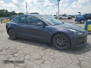2023 Tesla Model 3 with VIN 5YJ3E1EA7PF576007, listed as a Copart auction lot 61674915 with 15,956 mi miles and Salvage title. Bid and sale history available at DreamBid. Image 4.