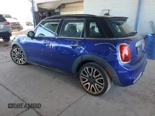 2019 MINI Hardtop 4 Door Cooper S z VIN WMWXU3C58K2H55626, wystawiony jako Copart lot #54404175 z przebiegiem 65 209 mil mil oraz Szkoda całkowita • Salvage title. Historia ofert i sprzedaży dostępna na DreamBid. Obrazek 2.
