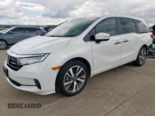 2022 Honda Odyssey Touring с VIN 5FNRL6H80NB050322, выставлен на аукционе Copart как лот 56160185 с пробегом 56 224 миль миль и Чистый • Clean title. История ставок и продаж доступна на DreamBid. Изображение 1.