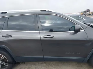 2015 Jeep Cherokee Latitude with VIN 1C4PJLCB0FW601862, listed as a IAAI auction lot 41931048 with 100,705 mi miles and . Bid and sale history available at DreamBid. Image 14.