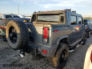 2005 Hummer H2 SUT with VIN 5GRGN22U15H125141, listed as a Copart auction lot 74180754 with 0 mi miles and Salvage Title. Bid and sale history available at carsss.com. Image 3.