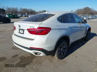 2017 BMW X6 xDrive35i z VIN 5UXKU2C3XH0U29395, wystawiony jako IAAI lot #41237496 z przebiegiem 82 836 mil mil oraz . Historia ofert i sprzedaży dostępna na DreamBid. Obrazek 4.