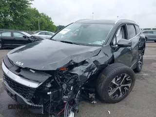 2023 Kia Sportage EX with VIN KNDPVCAG1P7110909, listed as a IAAI auction lot 42646436 with 16,304 mi miles and . Bid and sale history available at DreamBid. Image 6.