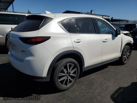 2017 Mazda CX-5 Grand Touring with VIN JM3KFBDL7H0202831, listed as a Copart auction lot 54943115 with 69,933 mi miles and Salvage Title. Bid and sale history available at carsss.com. Image 3.