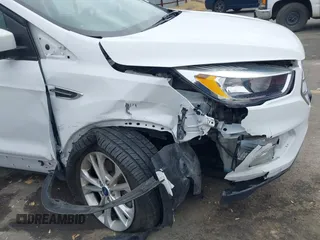 2018 Ford Escape SE z VIN 1FMCU9GD0JUC62783, wystawiony jako IAAI lot #41488153 z przebiegiem 55 774 mil mil oraz . Historia ofert i sprzedaży dostępna na DreamBid. Obrazek 6.