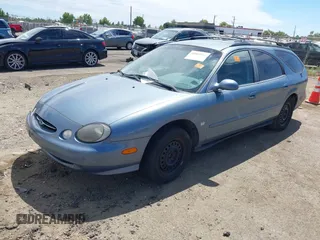 1999 Ford Taurus SE with VIN 1FAFP58S2XG227769, listed as a IAAI auction lot 42804314 with 162,630 mi miles and . Bid and sale history available at DreamBid. Image 2.