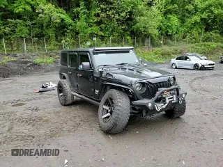 2018 Jeep Wrangler Unlimited Sport S z VIN 1C4HJXDG4JW137697, wystawiony jako Copart lot #56577525 z przebiegiem 42 297 mil mil oraz Szkoda całkowita • Salvage title. Historia ofert i sprzedaży dostępna na DreamBid. Obrazek 14.