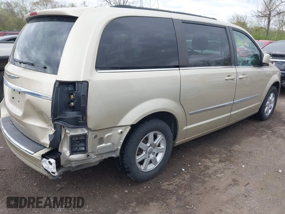 2011 Chrysler Town & Country Touring with VIN 2A4RR5DGXBR666934, listed as a IAAI auction lot 42022807 with 125,920 mi miles and . Bid and sale history available at DreamBid. Image 4.