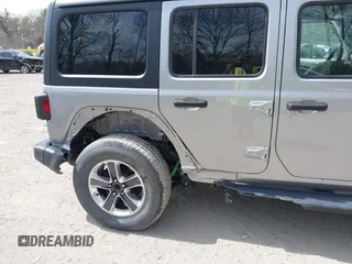 2018 Jeep Wrangler Unlimited Sahara with VIN 1C4HJXEG4JW141540, listed as a IAAI auction lot 42148402 with 43,909 mi miles and . Bid and sale history available at DreamBid. Image 6.