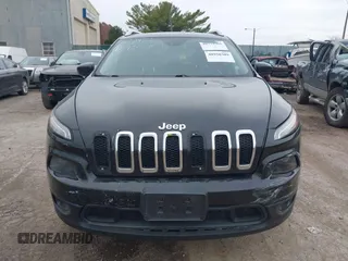 2014 Jeep Cherokee Latitude z VIN 1C4PJMCS5EW219542, wystawiony jako IAAI lot #40950309 z przebiegiem 154 099 mil mil oraz . Historia ofert i sprzedaży dostępna na DreamBid. Obrazek 12.