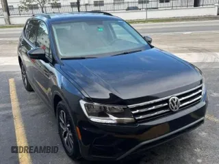 2021 Volkswagen Tiguan S z VIN 3VV1B7AX9MM105997, wystawiony jako Copart lot #57079115 z przebiegiem 146 399 mil mil oraz Czysty tytuł • Clean title. Historia ofert i sprzedaży dostępna na DreamBid. Obrazek 1.