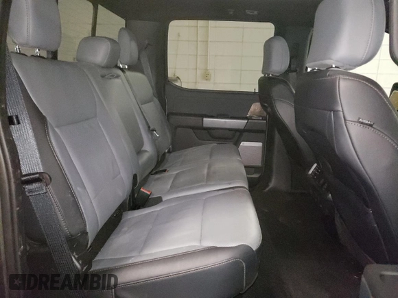2022 Ford F-150 Lightning Pro z VIN 1FT6W1EV7NWG10033, wystawiony jako Copart lot #81516533 z przebiegiem 11 282 mil mil oraz Szkody całkowita. Historia ofert i sprzedaży dostępna na DreamBid. Obrazek 10.
