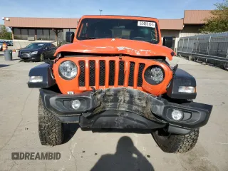 2019 Jeep Wrangler Unlimited Sport S with VIN 1C4HJXDGXKW557241, listed as a Copart auction lot 52485164 with 59,798 mi miles and Salvage title. Bid and sale history available at DreamBid. Image 5.