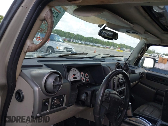 2003 Hummer H2 z VIN 5GRGN23U63H131139, wystawiony jako IAAI lot #42540561 z przebiegiem 182 365 mil mil oraz . Historia ofert i sprzedaży dostępna na DreamBid. Obrazek 13.