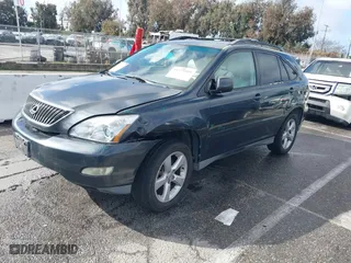 2005 Lexus RX 330 with VIN 2T2GA31U35C032139, listed as a IAAI auction lot 41579595 with 207,413 mi miles. Bid and sale history available at carsss.com. Image 2.