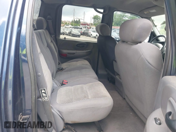 2003 Ford F-150 XLT with VIN 1FTRW08L73KB50541, listed as a IAAI auction lot 42740941 with 181,828 mi miles and . Bid and sale history available at DreamBid. Image 8.