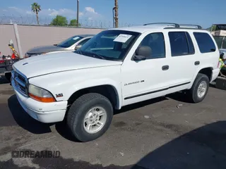 1999 Dodge Durango z VIN 1B4HS28Y1XF619973, wystawiony jako IAAI lot #42399672 z przebiegiem 192 812 mil mil oraz . Historia ofert i sprzedaży dostępna na DreamBid. Obrazek 2.